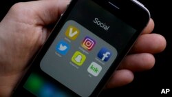 The social media app icons on a smartphone held by an Associated Press reporter in San Francisco, June 16, 2017.