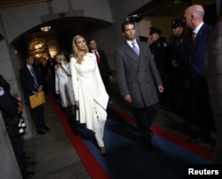 FILE - Ivanka Trump, left, and Donald Trump Jr. arrive on the West Front of the U.S. Capitol in Washington, D.C., Jan. 20, 2017.