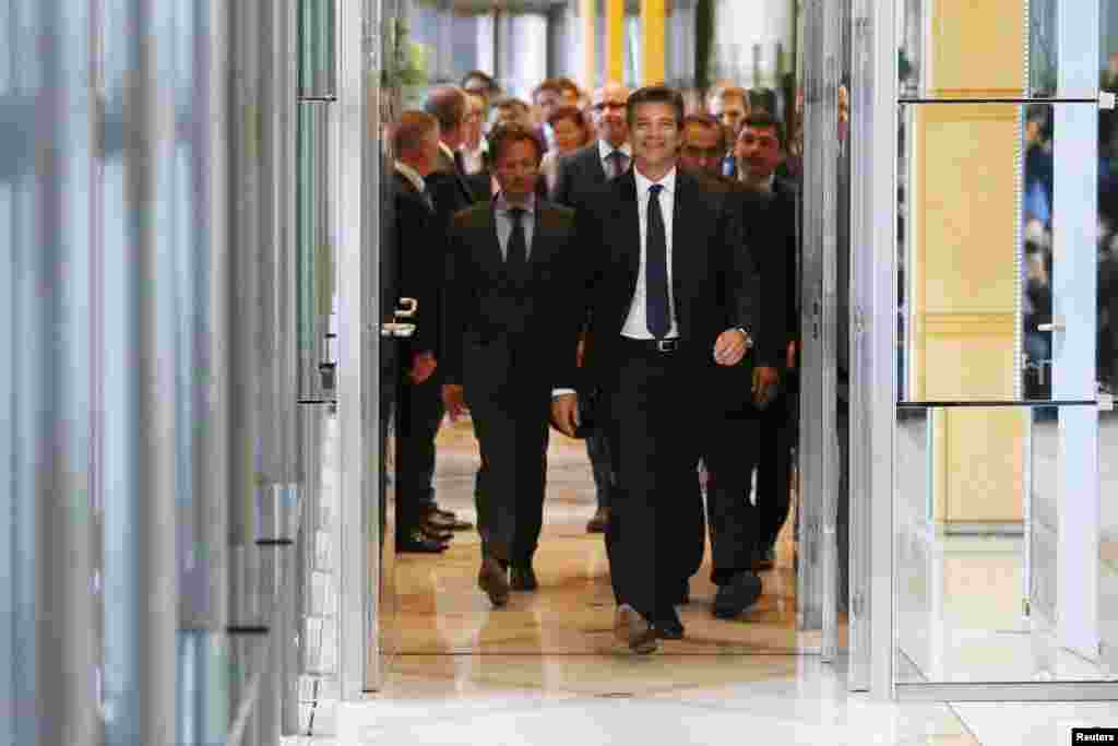 A sledding dog is covered in ice after spending the night in the open air with his musher at the polar base of Val-Cenis, as they ready for the next stage of the 12th edition of &quot;La Grande Odyssee&quot; sledding race across the Alps in Val Cenis Lanslevillard, France.