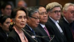 FILE - Myanmar's leader Aung San Suu Kyi attends a hearing in a case filed by Gambia against Myanmar alleging genocide against the minority Muslim Rohingya population, at the International Court of Justice Dec.10, 2019.