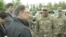 U.S. Special Representative for Ukraine Negotiations Kurt Volker, third from left, meets with Ukrainian troops at an undisclosed location near Popasna, Donbas region, Ukraine, May 15, 2018. (M. Gongadze/VOA)