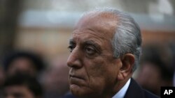 FILE - Washington's peace envoy Zalmay Khalilzad attends the inauguration ceremony for Afghan President Ashraf Ghani at the presidential palace in Kabul, Afghanistan, March 9, 2020. 