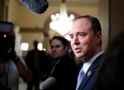 FILE - Rep. Adam Schiff, D-Calif., ranking member of the House Intelligence Committee, speaks with reporters on Capitol Hill, April 19, 2019..