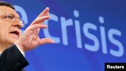 European Commission President Jose Manuel Barroso gestures as he addresses a news conference in Brussels, May 29, 2013.