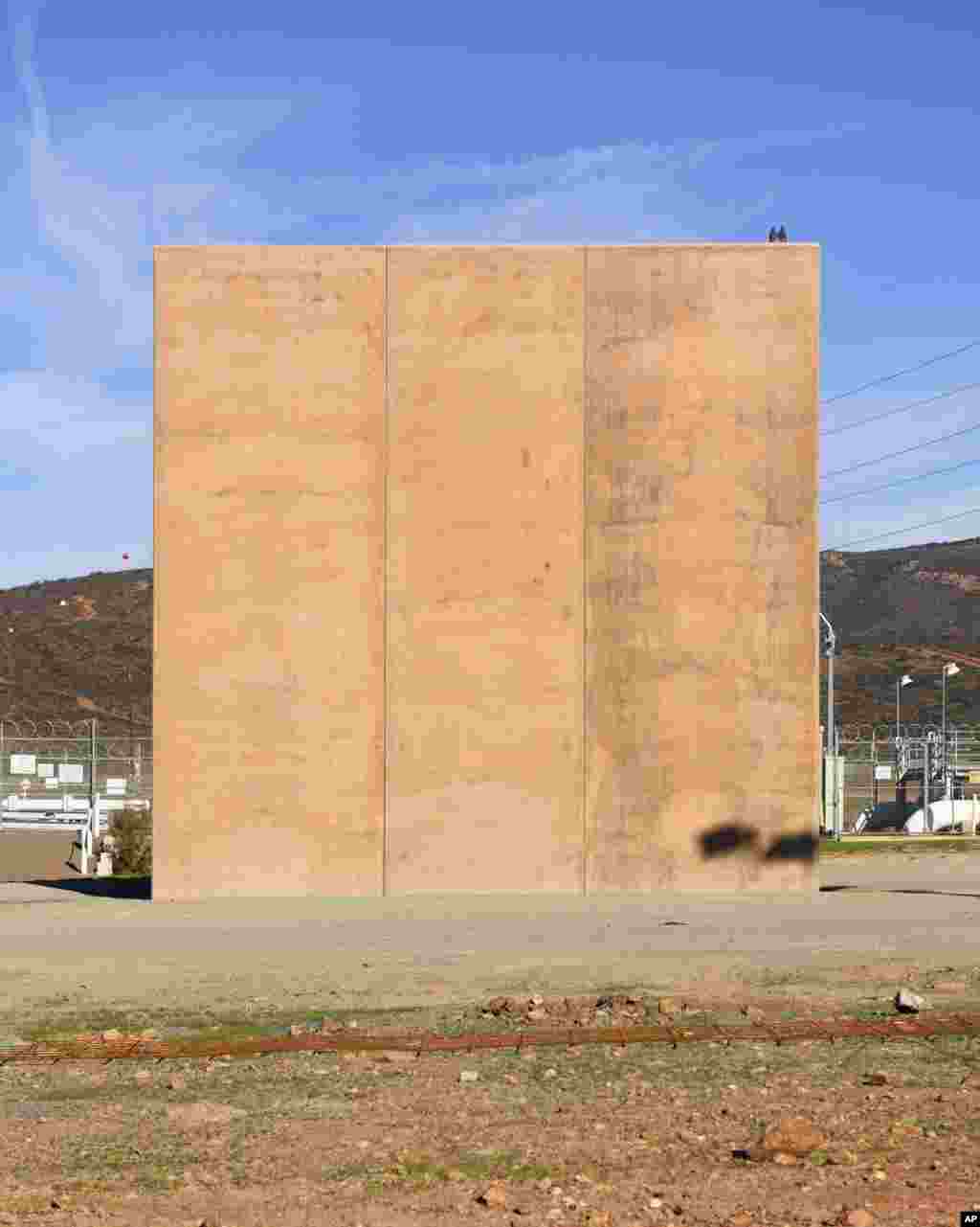 A border wall prototype stands in San Diego near the Mexico-U.S. border, seen from Tijuana, Mexico, Dec. 22, 2018.