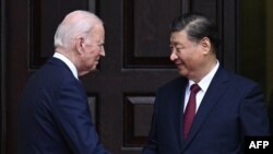 شی جینپینگ، رییس جمهور چین (راست) و جو بایدن، رییس جمهور ایالات متحده (آرشیف)