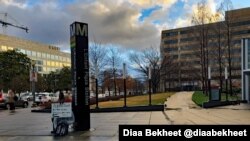 FILE - A woman begs for money outside a subway station in Washington, DC. (Photo: Diaa Bekheet)