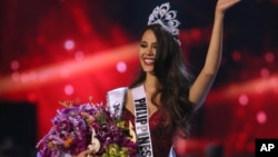 Catriona Gray of the Philippines waves to the audience after being crowned the new Miss Universe 2018 during the final round of the 67th Miss Universe competition in Bangkok, Thailand, Monday, Dec. 17, 2018.