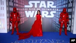 FILE - Actress Kelly Marie Tran poses for photographers upon arrival at the premiere for the film "Star Wars: The Rise of Skywalker," in central London.