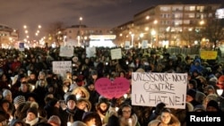People attend a vigil in support of the Muslim community in Montreal, Quebec, Jan. 30, 2017.