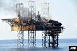 Foto yang dirilis PTTEP Australia pada 3 November 2009 tampak anjungan pengeboran minyak West Atlas dan kepala sumur Montara setelah kebocoran berhasil di atasi dan kebakaran pada kepala sumur utama dipadamkan. Kedua fasilitas berlokasi 250 km barat laut panta