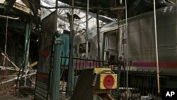 This photo provided by the National Transportation Safety Board shows damage done to the Hoboken Terminal in Hoboken, New Jersey, Oct. 1, 2016, after a commuter train crash that killed one person and injured more than 100 others last week.