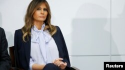 U.S. first lady Melania Trump waits to speak at the Federal Partners in Bullying Prevention (FPBP) Cyberbullying Prevention Summit on “the positive and negative effects of social media on youth” in Rockville, Maryland, Aug. 20, 2018. 