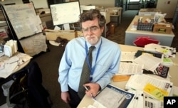 FILE - Mark Potok, of the Southern Poverty Law Center, stands in the center's office in Montgomery, Ala., June 12, 2009.