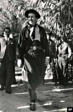 Walt Disney in full gaucho dress at an event hosted by the Cartoonists Association of Argentina.