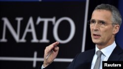 NATO Secretary-General Jens Stoltenberg talks to reporters at a NATO defense ministers meeting at the alliance headquarters in Brussels, Belgium, Nov. 8, 2017. 