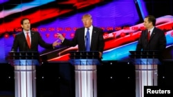 'Yan Republican uku dake neman jam'iyyar ta tsayar dasu takarar shugaban kasa: Daga hagu Rubio, na tsakiya Trump da na dama Cruz