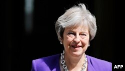 La première ministre britannique, Theresa May, avant la session hebdomadaire des questions à la Chambre des communes, le 4 juillet 2018.