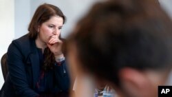 Sarah Moriarty, the daughter of Robert Levinson, a U.S. hostage in Iran, listens during a news conference in Washington, Dec. 3, 2019.