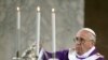 Pope Francis blesses the altar during the Ash Wednesday mass at the Santa Sabina Basilica in Rome, March 5, 2014.