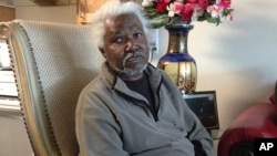 This June 6, 2017 photo shows Girard Townsend in Detroit. The 66-year-old recalls the looting of shops in some Detroit neighborhoods during the 1967 riot.