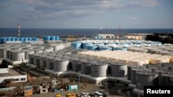 FILE - Storage tanks for radioactive water are seen at Tokyo Electric Power Co's tsunami-damaged Fukushima Daiichi nuclear power plant in Okuma town, Fukushima prefecture, Japan, Feb. 18, 2019. 