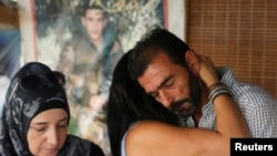Relatives of Lebanese soldiers, who were captured by Islamist militants, are seen in their sit-in tent in Beirut, Lebanon, Aug. 27, 2017. 