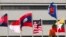 FILE - In this April 22, 2021, photo, flags of some of the ASEAN member countries fly at the ASEAN Secretariat in Jakarta, Indonesia.