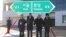 South and North Korean officials unveil the sign of Seoul to Pyeongyang during a groundbreaking ceremony for the reconnection of railways and roads at the Panmun Station in Kaesong, North Korea, Dec. 26, 2018. (Yonhap via Reuters)