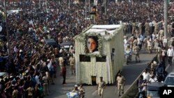 The body of Indian actress Sridevi is carried in truck during her funeral in Mumbai, India, Wednesday, Feb. 28, 2018.