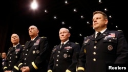 U.S. Army Generals stand ready to testify about pending legislation regarding sexual assaults in the military at a Senate Armed Services Committee on Capitol Hill in Washington, June 4, 2013.