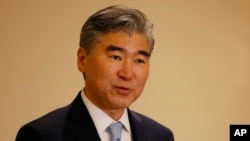 New U.S. Ambassador to the Philippines Sung Kim addresses the media shortly upon arrival, Dec. 1, 2016, at the Ninoy Aquino International Airport in suburban Pasay city south of Manila, Philippines.