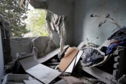 Posljedica rakete, koju je ispalio Hamas, u izraleskom gradu Ashelon, 11. maj 2021.