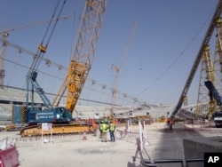 FILE - Construction work is under way at the Khalifa Stadium in Doha, Qatar, Nov. 9, 2014. It is one of the venues being redeveloped as Qatar prepares to host the 2022 World Cup.
