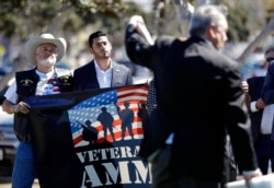 Latino, Arab-American businessman Ammar Campa-Najjar (center) ran for Congress in Southern California's 50th district, pictured Oct. 16, 2018, in San Diego.