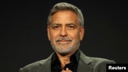 Actor, executive producer, and director George Clooney speaks on a panel for the Hulu series "Catch-22", during the Television Critics Association (TCA) Winter Press Tour in Pasadena, California, Feb. 11, 2019. 