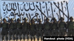 FILE - In Afghanistan, the Taliban released to the media this picture, which it said shows the suicide bombers who attacked the army base in Mazar-i-Sharif, April 21, 2017.