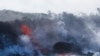 Lahar akibat letusan gunung Kilauea mengalir ke Samudera Pasifik dekat kota Pahoa, Hawaii (20/5). 