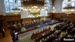 FILE - A ceremony marks the 70th anniversary of the International Court of Justice in The Hague, Netherlands, April 20, 2016. 