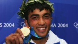 ილიას ილიადისი იგივე ჯარჯი ზვიადაური ოლიმპიური ოქროს მედლით