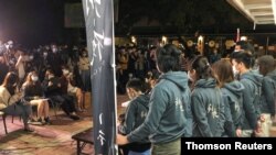 Members of the Chinese University of Hong Kong (CUHK)'s student union hold a news conference over national security concerns, in Hong Kong, Feb. 26, 2021.