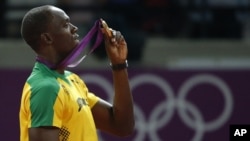 Pelari Jamaica Usain Bolt kembali menjadi favorit kuat Kejuaran Dunia Atletik nomor 100 dan 200 meter setelah dua pesaingnya gagal tes doping (foto: dok). 