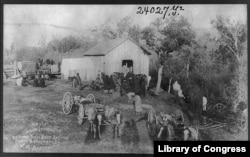 Sioux Indians waiting for monthly beef rations, Rosebud Reservation, South Dakota, c. 1893