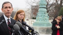 Plaintiff Abigail Fisher (2-L) is seen with conservative advocate Edward Blum (L) outside the U.S. Supreme Court in Washington, D.C., Dec. 9, 2015. (Photo - A. Scott/VOA)