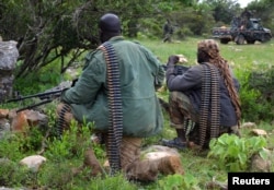 Soldiers from Somalia's Puntland keep guard on high grounds at the Galgala hills, during preparations for an offense against al-Shabaab militants, north of the capital Mogadishu, Jan. 9, 2015.