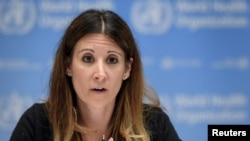 FILE - WHO epidemiologist Maria Van Kerkhove — pictured at WHO headquarters in Geneva, Switzerland, on July 3, 2020 — said on Thursday that scientists and others need to share what they know about COVID-19. "This is not a game," she said.