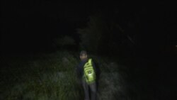 After a brief goodbye to his family, Victor Cal, begins his journey to the United States as he leaves his home in the makeshift settlement Nuevo Queja, Guatemala, Friday, July 9, 2021. (AP Photo/Rodrigo Abd)