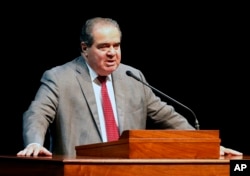 FILE - Supreme Court Justice Antonin Scalia speaks at the University of Minnesota in Minneapolis.