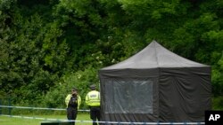 英国警方2024年5月22日在一个公园发现被指控协助香港情报机构从事间谍活动、英国前皇家海军陆战队员马修·特里克特（Matthew Trickett）的尸体。（美联社）