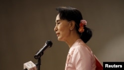 Myanmar pro-democracy leader Aung San Suu Kyi gives a speech during a World Press Freedom Day ceremony in Yangon, May 3, 2015. 